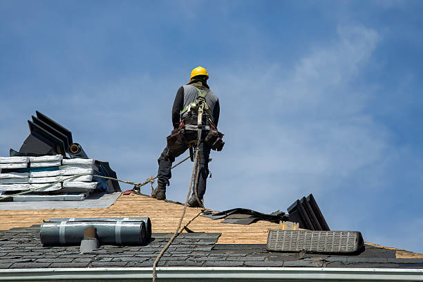 Professional Roofing technician working in Florissant, MO